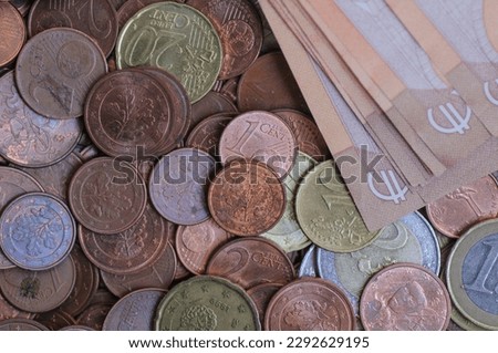 Euro coins and banknotes as a background, closeup of photo