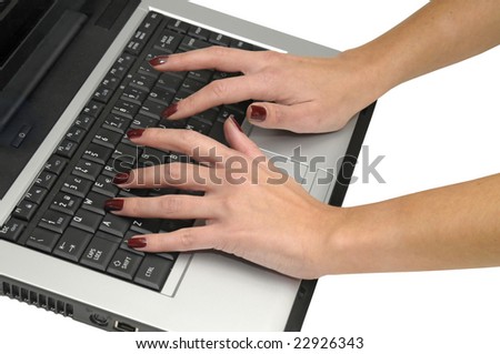 Hands on the keyboard of a Laptop