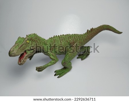 Ancient dinosaurs look fierce against a white background