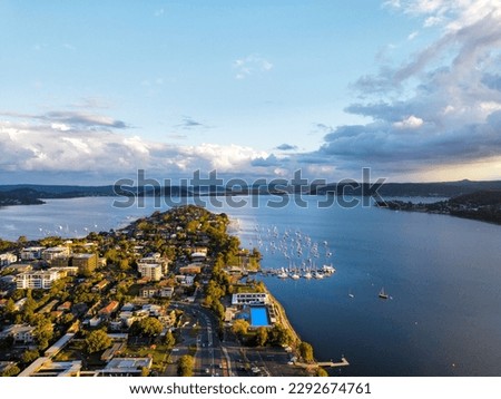 An aerial photograph of Point Frederick looking south, on the Central Coast of New South Wales, Australia, during the Golden Hour  Royalty-Free Stock Photo #2292674761