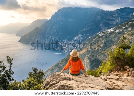Young girl on Positano coast background, Amalfi, Italy Royalty-Free Stock Photo #2292709443