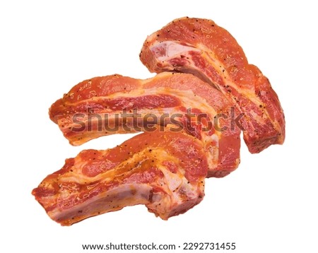 Pork rib marinated with spices a piece of meat on a white background Royalty-Free Stock Photo #2292731455