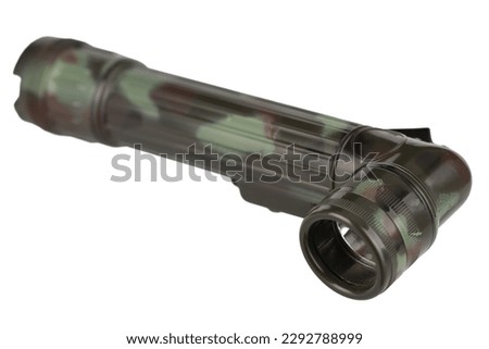 military style flashlight isolated on white background