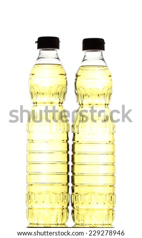 Bottle of vegetable oil for cooking isolated on white