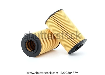 Air, fuel or oil filters isolated on a white background. Car servicing and vehicle filters replacing maintenance Royalty-Free Stock Photo #2292804879