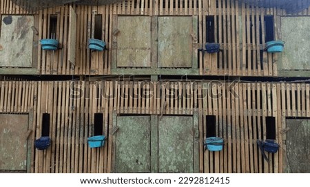 This rooster cage is equipped with a place to eat and a place for drinking water, this cage is made of wood and bamboo which were previously dried le