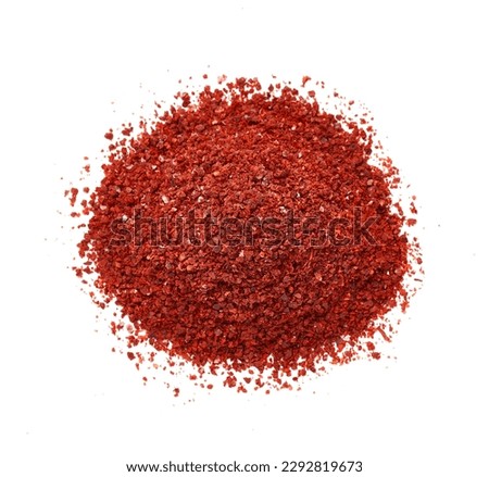 dry red chili pepper flake or ground powder coarse paprika isolated on white background. pile of red chili pepper flake or ground powder coarse paprika isolated. top view overhead Royalty-Free Stock Photo #2292819673