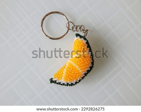 Fruit colorful key chain and sea conch. Bead colorful key chain and stones