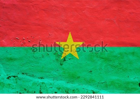 Burkina Faso flag Burkina Faso village by raiders ‘wearing military uniforms’