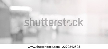 abstract blurry loft cozy interior office workplace background with light window effect for banner , ads design