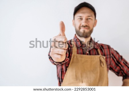 Business owner worker in apron on blank white banner background. Private business concept. Royalty-Free Stock Photo #2292853001