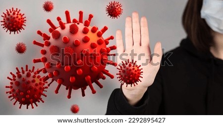 The girl is afraid of a flying virus, closes herself with her hands from a mutating virus. Royalty-Free Stock Photo #2292895427