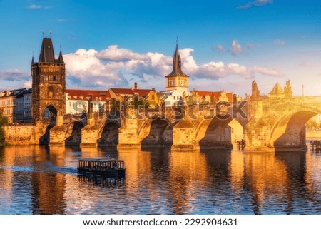 Charles Bridge in Prague in Czechia. Prague, Czech Republic. Charles Bridge (Karluv Most) and Old Town Tower. Vltava River and Charles Bridge. Concept of world travel, sightseeing and tourism. Royalty-Free Stock Photo #2292904631