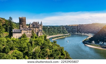 Katz castle and romantic Rhine in summer at sunset, Germany. Katz Castle or Burg Katz is a castle ruin above the St. Goarshausen town in Rhineland-Palatinate region, Germany Royalty-Free Stock Photo #2292905807