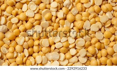 Dry yellow split peas top veiw Royalty-Free Stock Photo #2292916233