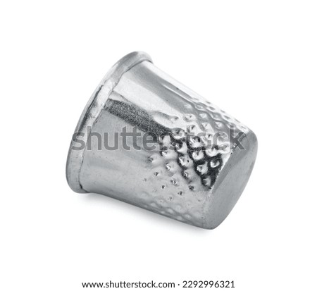 Silver metal sewing thimble isolated on white
