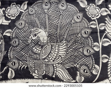 Black and white peacock motif with details hand drawn with kalamkari art of India