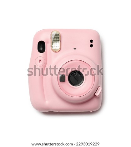 Pink camera isolated on white background top view Royalty-Free Stock Photo #2293019229