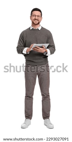 Handsome bearded businessman in eyeglasses with tablet on white background Royalty-Free Stock Photo #2293027091
