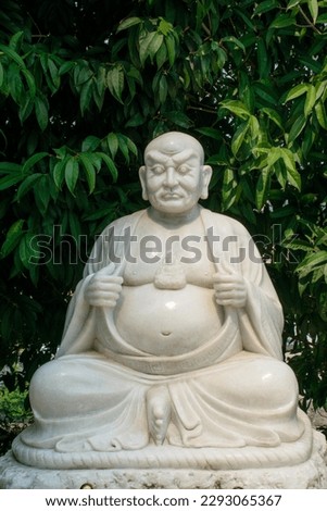 Ancient white monk statue in Chinese temple wat Hyua Pla Kang 