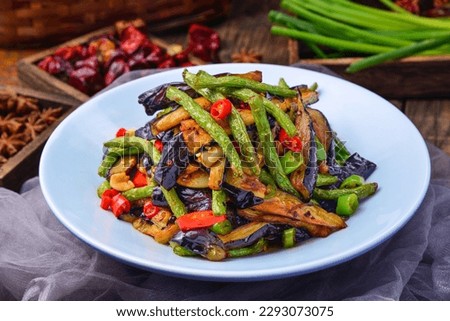 Sautéed （stir fried）Green bean and Eggplant with Soy Bean Paste  Royalty-Free Stock Photo #2293073075