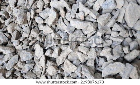 Gravel texture or gravel background for design. Real grunge texture background and small stone.Top view of ground gravel road. 