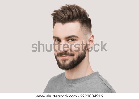 Smiling man studio portrait isolated. People, male beauty, student, lifestyle concept Royalty-Free Stock Photo #2293084919