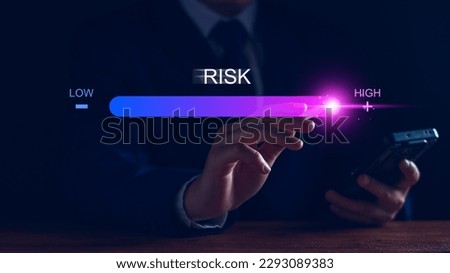 Risk management and chance to increase exposure for financial investment, projects, engineering, business. get maximum profit. Concept with manager's hand slide to high level. Fully open to risk. Royalty-Free Stock Photo #2293089383