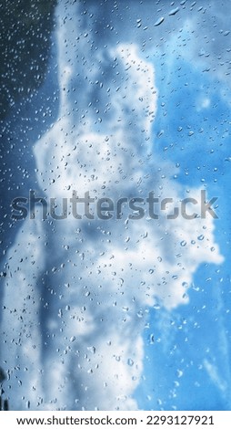 Rain drops, Drops on glass refer to water droplets that form on the surface of a glass material due to condensation, precipitation, or other factors