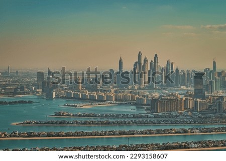 View from Dubai Palm Island. Skyscrapers in the background. The picture was taken from a helicopter.