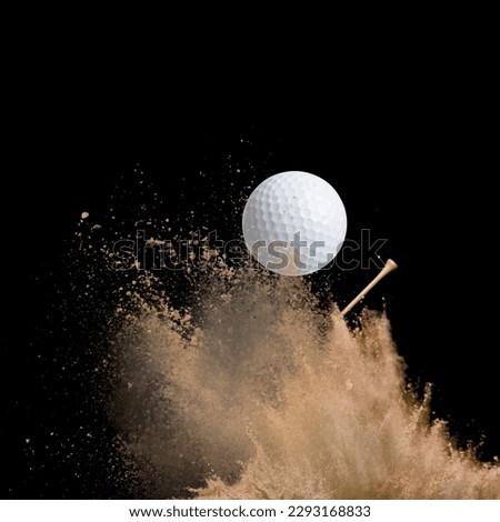 White sport golf ball in dry sand