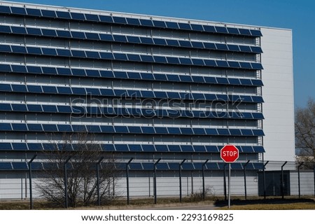 Photovoltaic panels on the wall of building