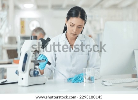 Setting up for a new clinical trial. a young scientist working with samples in a lab. Royalty-Free Stock Photo #2293180145