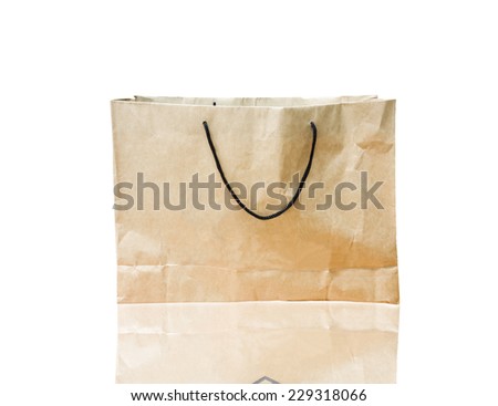 Brown shopping paper bag isolated on white background