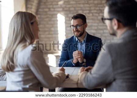 Broker manager talking with client at office Royalty-Free Stock Photo #2293186243