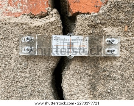 Fracture Monitoring And Determination of Crack Width in Concrete, Special Eqipment And Instruments, Building Architecture, "Beacons" or So-called "Observers" Cracks to Determine the Bearing Capacity Royalty-Free Stock Photo #2293199721