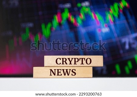 Wooden blocks with words 'Crypto News'. Business concept