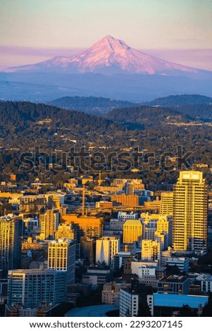 Portland, Oregon, USA downtown skyline with Mt. Hood at dawn, view from from Pittock Mansion