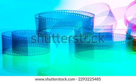 multicolored background with film strip. cinematography film production film industry film festival concept