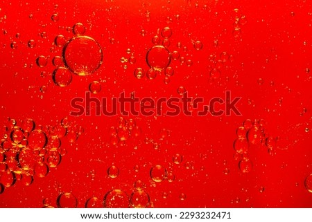 macro red bubbles,red macro bubbles,Backgrounds, Abstract Backgrounds, Soda, Red, Carbonated,Beauty concept background. Closeup cosmetic liquid gel with bubbles on red colors background