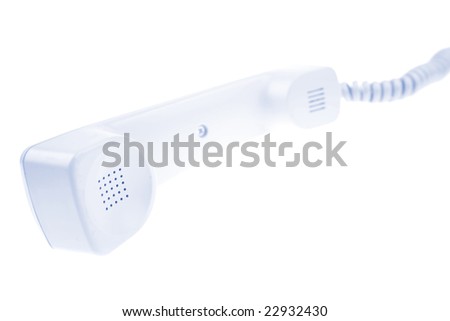 Telephone receiver on white background
