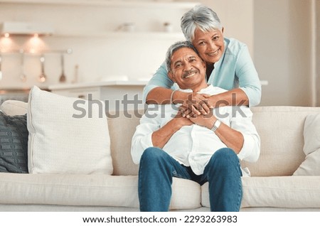 As in-love as the first day. a happy senior couple relaxing on the sofa at home. Royalty-Free Stock Photo #2293263983
