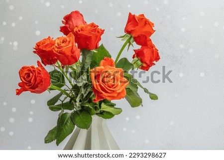 Bouquet of fresh bright roses on vase. Romantic gift concept, greeting card. Valentines, Woman's or Mothers Day. Wedding, Anniversary, Birthday, flat lay, stone concrete background, copy space