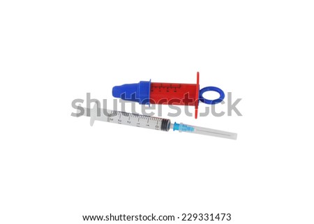 Medical syringe. Toy and present. Isolated on white.                               