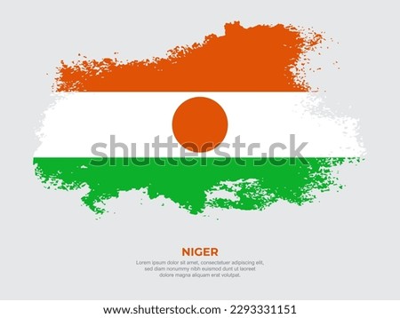 Vintage grunge style Niger flag with brush stroke effect vector illustration on solid background
