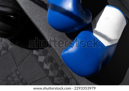 pair of boxing gloves. leather Boxing gloves. boxing accessories background. boxing equipment. blue.