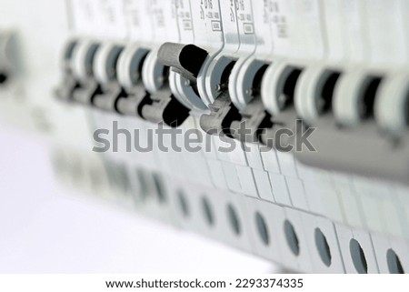 electric circuit breakers against overload and short circuit in the load.  Royalty-Free Stock Photo #2293374335