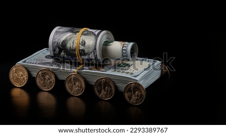 Conceptual plot about the profit of the military-industrial complex with a tank made from american dollars Royalty-Free Stock Photo #2293389767
