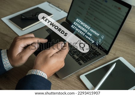 businessmanman search website for content keywords on laptop browse in office optimize seo engine Royalty-Free Stock Photo #2293415907