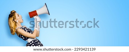 Profile side view image of beautiful woman hold mega phone, shout advertise some offer. Pretty girl in black pin up dress with megaphone loudspeaker. Isolated yellow background. Big sales ad. Wide Royalty-Free Stock Photo #2293421139